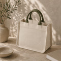 Oatmeal mini canvas tote with muted olive handles, structured cotton canvas bag for everyday essentials.