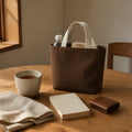 PLANEA Umber mini canvas tote in a quiet home setting